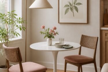 Small apartment dining nook with a round table for two